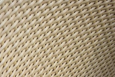 Bej örülmüş hasır kumaşın detaylı doku arka planı karmaşık çapraz desenler ve iç tasarım duvar kâğıdı ya da arka plan için uygun sıcak ve doğal hislere sahip sağlam zanaat gösteriyor.