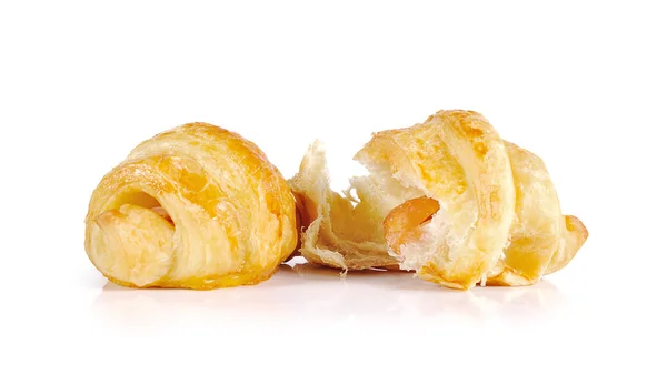 Croissant zblízka izolované na bílém pozadí — Stock fotografie