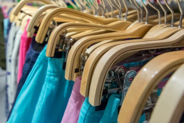 Multicolored Clothing Hangers Rail Retail Shops Royalty Free Stock Images