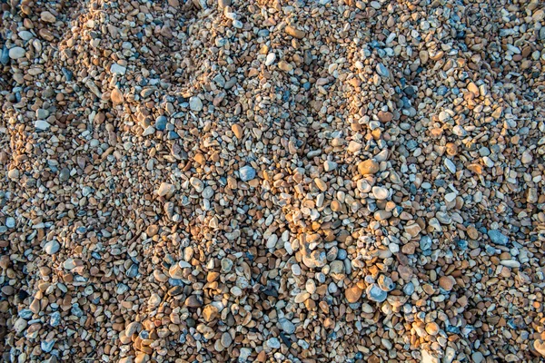 Kleine Kieselsteine am Strand — Stockfoto