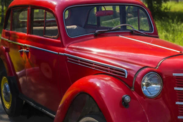 Red car with chrome accents — Stock Photo, Image