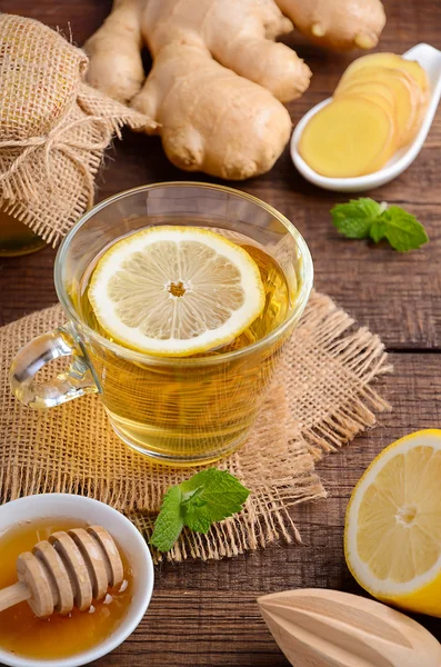 Ginger root tea with lemon and honey on wooden background — Stock Photo, Image