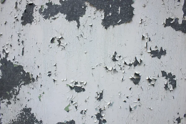 Sheet metal with peeling white paint — Stock Photo, Image