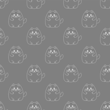 Gri arka plandaki kedi