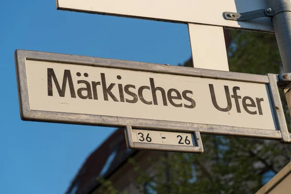 Maerkisches Ufer street name sign in Berlin. The pier Mrkisches Ufer is a departure point for several river cruises through the Germany\'s capital city