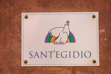 Roma, İtalya - 14 Temmuz 2019: Sant 'Egidio Topluluğu Amblemi (İtalyan Comunit di Sant' Egidio), sosyal hizmetlere adanmış bir katolik derneği.