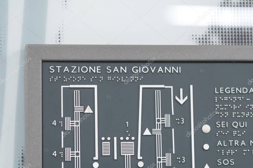 Rome, Italy - January 17, 2021: San Giovanni railway station, tactile map in Braille writing