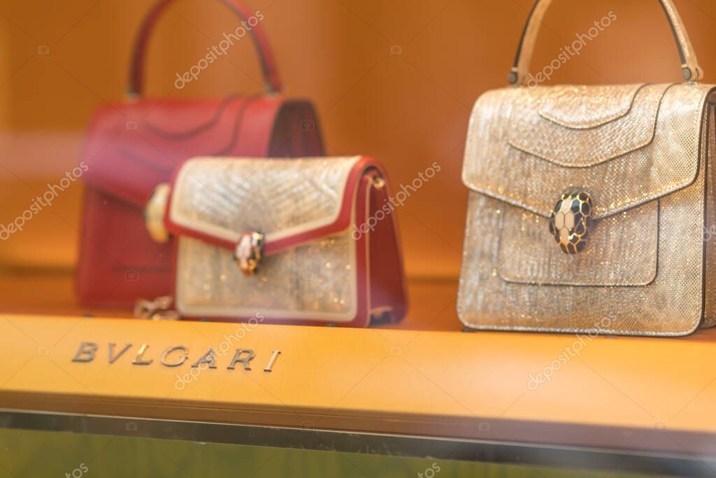 Hamburg, Germany - March 28, 2021: Bulgari handbags displayed in a sho window. Bulgari is a successful Italian jewellery company