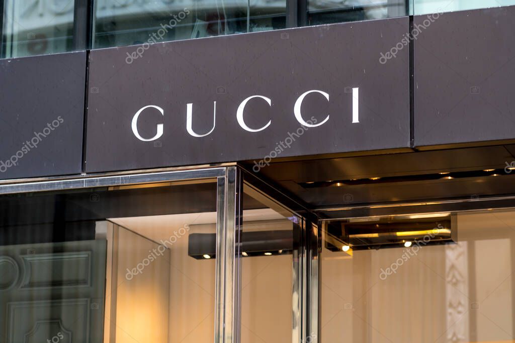 Hamburg, Germany - March 28, 2021: Gucci boutique. Gucci is an Italian luxury brand of fashion and leather goods, part of the Gucci Group, which is owned by the French holding company Kering
