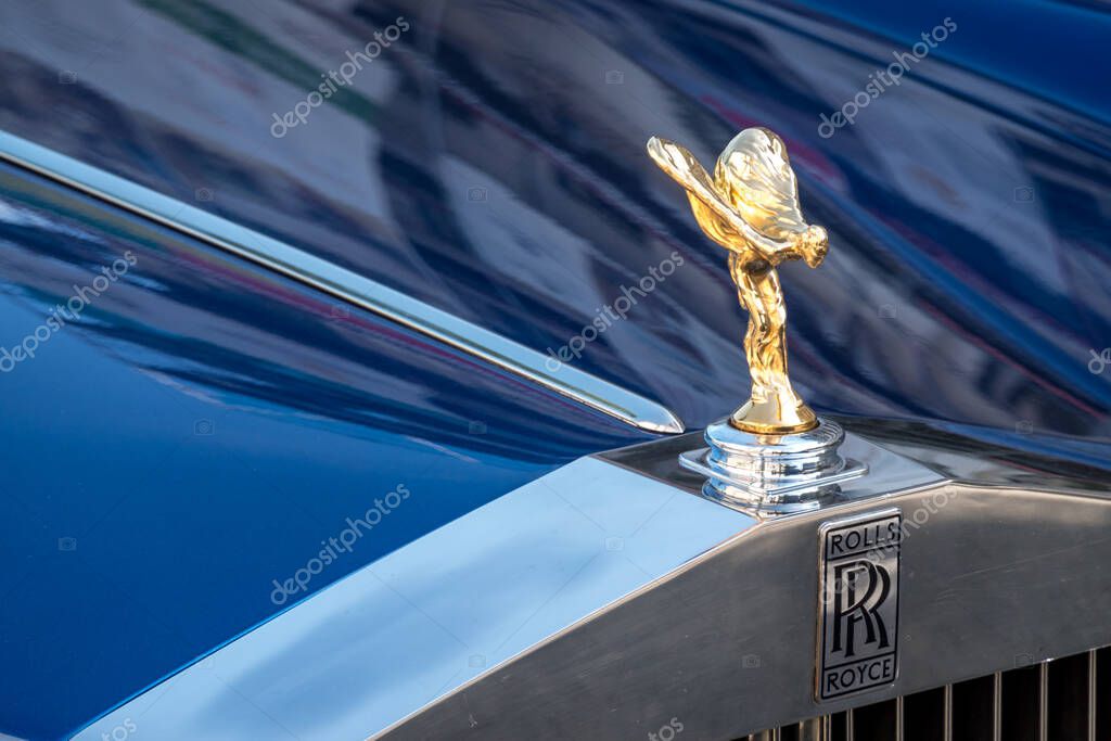 Berlin, Germany - September 2, 2021: Rolls Royce car and its hood ornament, the Spirit of Ecstasy