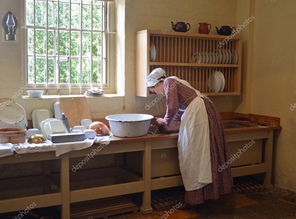 Young Woman Dressed As Victoria Kitchen Maid Washing Dishes In Sink Stock Editorial Photo Umdash9 108854622