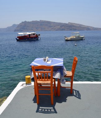 Amoudi Bay on the greek island of Santorini clipart