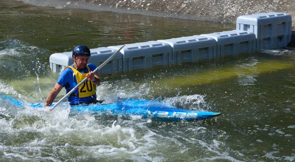 Male Competitor in competition at Bedford Viking Kayak Club Cardington Slalom Course.