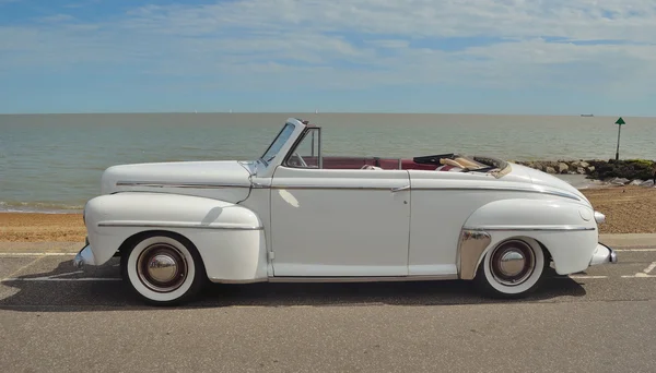 Classic Ford Super Delux motorcar in show on seafront. — Stock Photo, Image