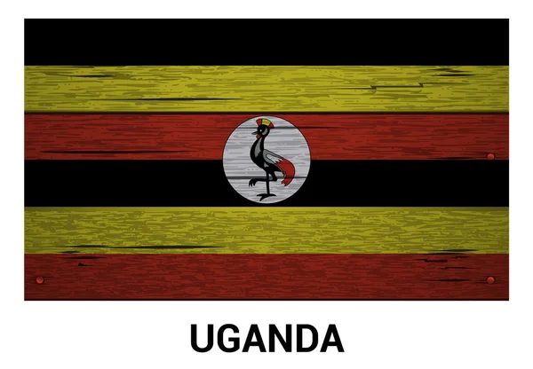 Uganda flag on wood texture background — Stock Vector