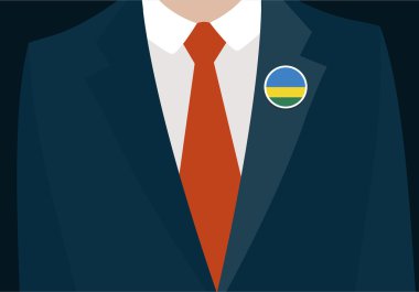 Ruanda bayrağı rozeti olan işadamı