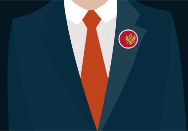 Karadağ bayrağı rozeti olan işadamı