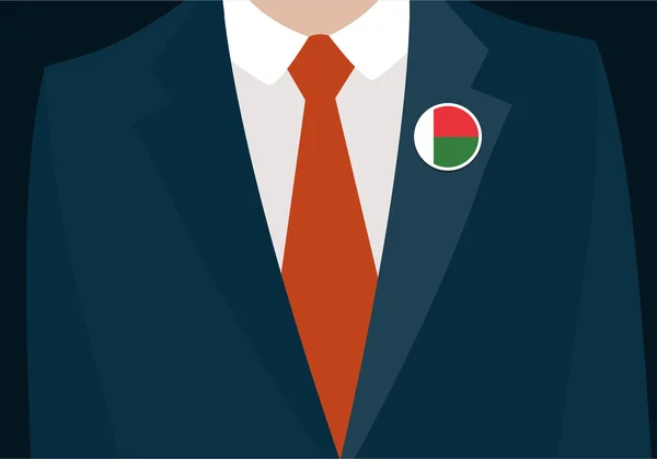 Affärsman med Madagaskar flagga badge — Stock vektor