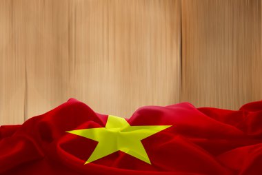 Vietnam bayrağı ve ahşap arka plan