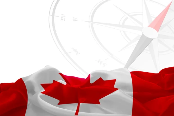 Канадський прапор і компас — стокове фото