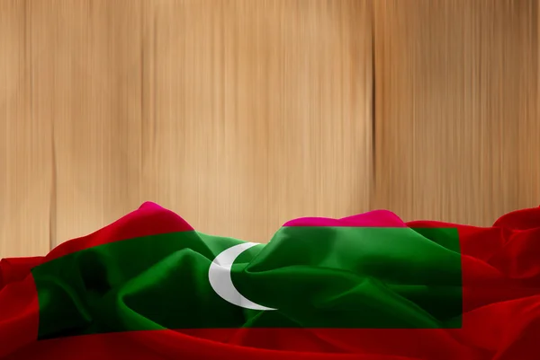 Maldiven vlag en hout achtergrond — Stockfoto
