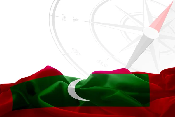 Maldives flag and Navigation compass — Stock Photo, Image