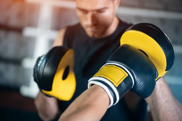 Close up of man boxing sparring or fighting in boxing gloves at ring — Stock Photo, Image