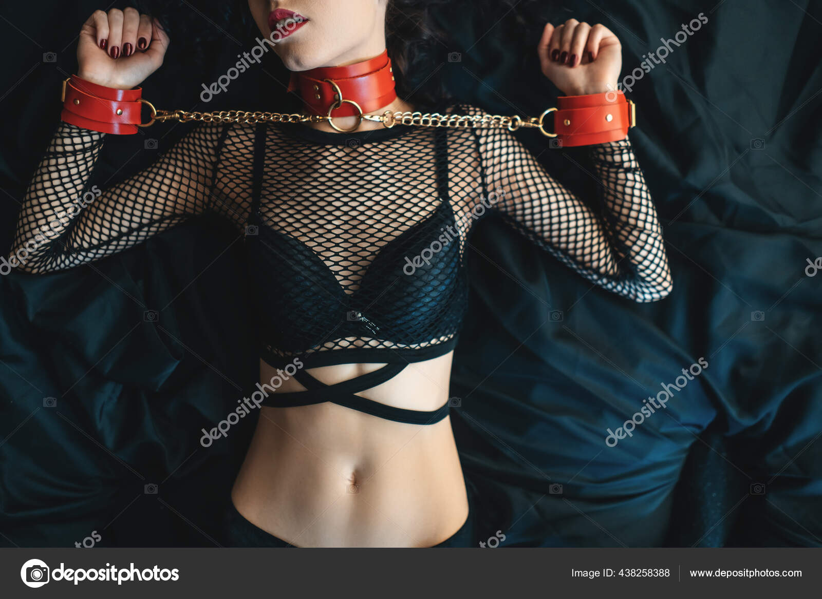 Sensual female with red lips, leather bondage collar choker and handcuff Stock Photo by ©goami 438258388