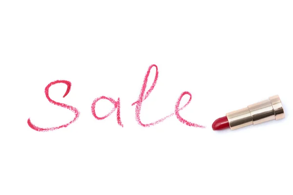 Word "sale", written with red lipstick on white isolated backgro — Stock Photo, Image