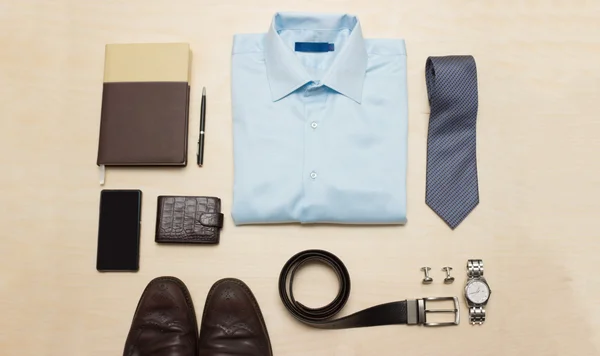 Mens classic outfit with blue shirt, tie and accessories