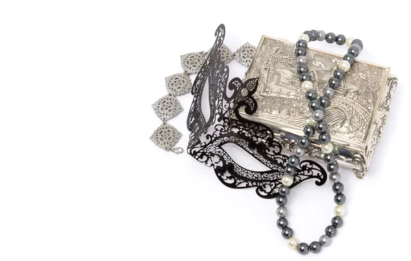 Black carnivale mask with silver bracelet and box, and pearl nec