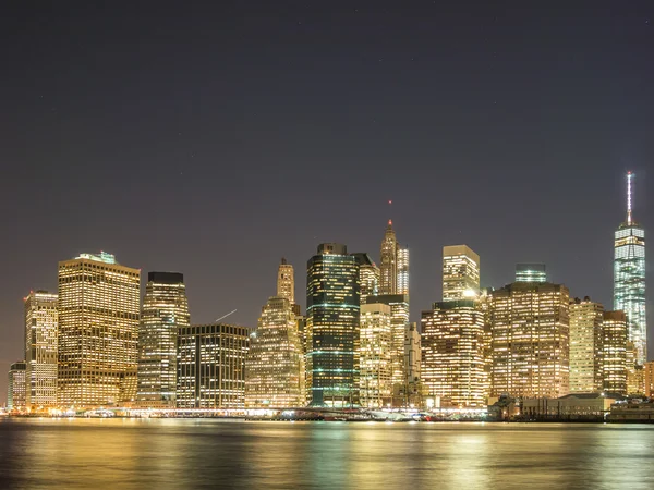 Manhattan světla v noci — Stock fotografie