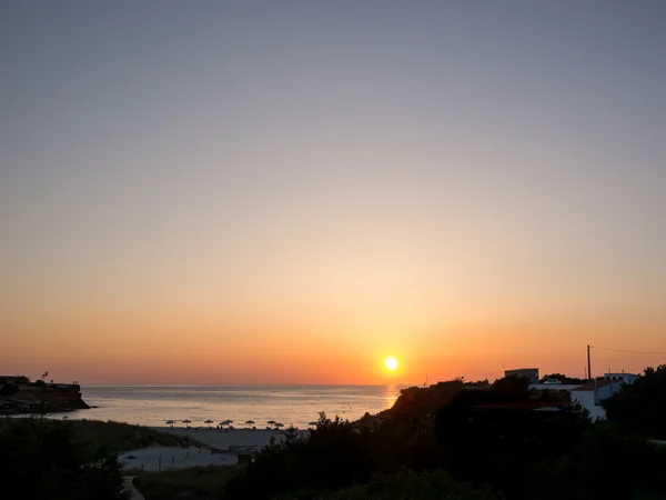 Puesta de sol en Cala Saona — Foto de Stock