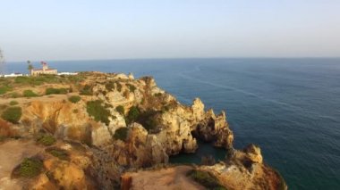 Ponta da Piedade lighthouse cliff Okyanusu günbatımı, Lagos, havadan görünümü, yakın Tarih