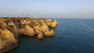 Ponta da Piedade lighthouse cliff Okyanusu günbatımı, Lagos, havadan görünümü, yakın Tarih