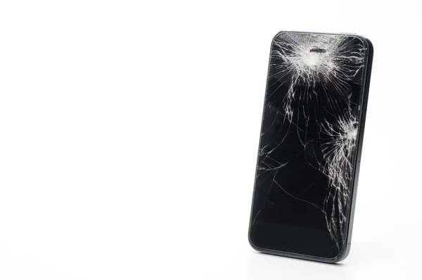 Smartphone seluler dengan layar rusak terisolasi di latar belakang putih Stok Foto Bebas Royalti