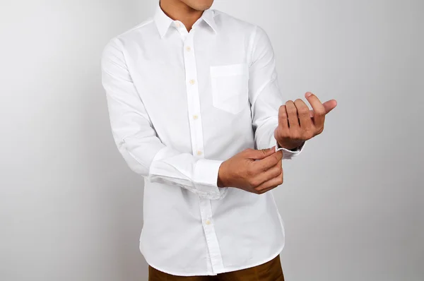 Człowiek sobie białą koszulę. Białe tło — Zdjęcie stockowe