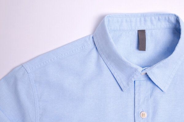 Blue plain cotton shirt White background