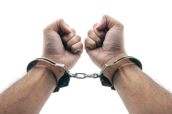 man in shackles on white background
