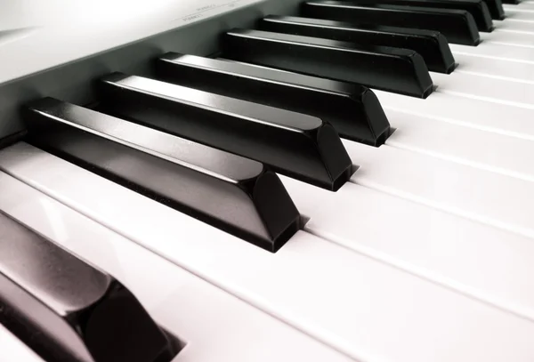 Close-up de teclas de piano. vista frontal fechada . — Fotografia de Stock