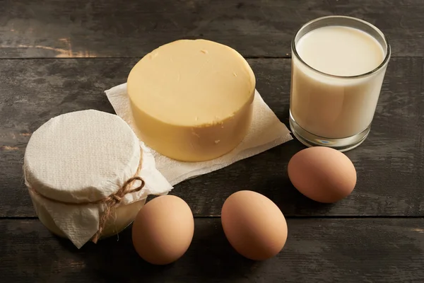 eggs, butter, milk, sour cream on a table close-up