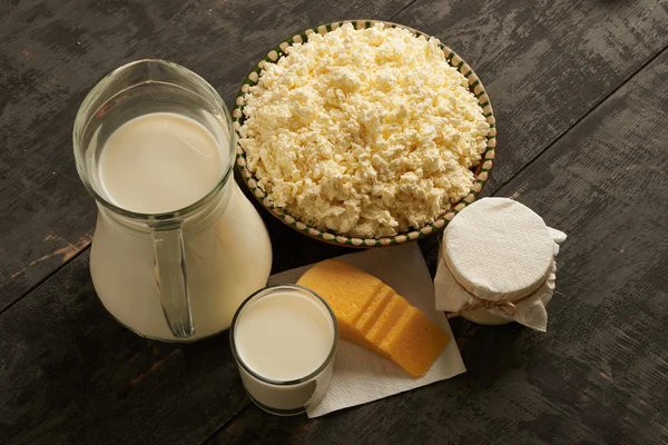 various dairy products on a wooden table