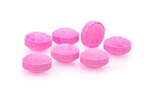 Růžové pilulky closeup drog makro fotografie — Stock fotografie