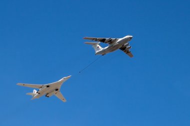 Strategic bomber and tanker aircraft in flight clipart