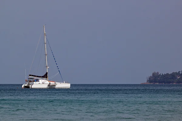 Small yacht near seashore