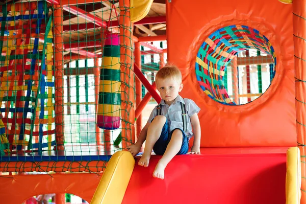 Indoor playground with colorful plastic balls for children.