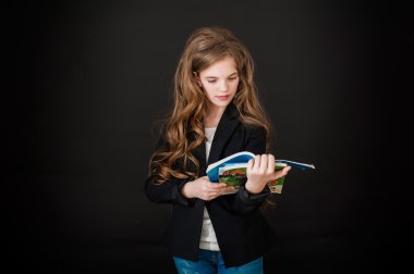 girl, teenager, smile, happiness, black background, long hair, blue eyes, jeans, curly hair, schoolgirl. school, university, student, study, knowledge