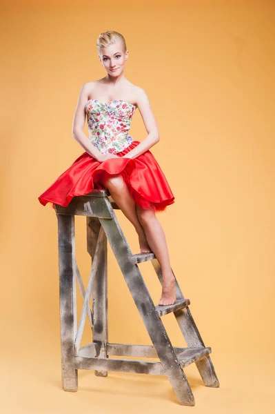 The girl on a ladder