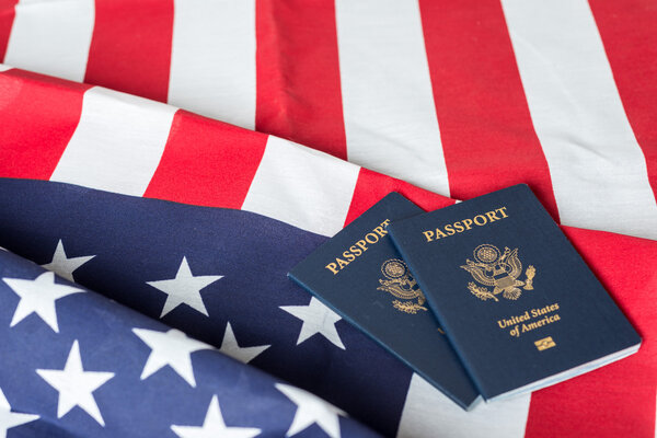 American flag with American Passports