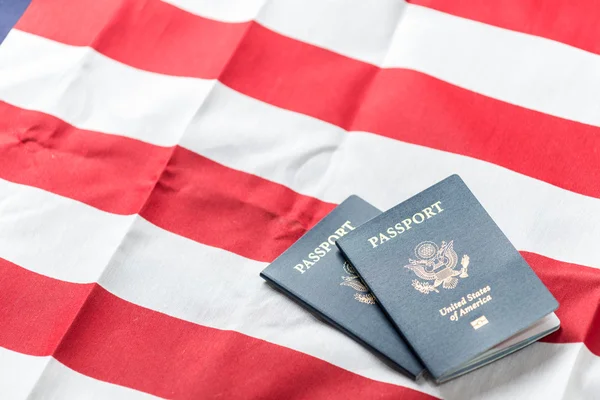 American flag with American Passports